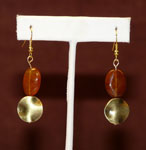 Dark orange stone with bronze earrings